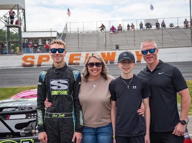 Joel with his family at the speedway